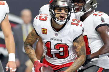 Fan Scores Big as Mike Evans Tosses Away Historic 100th Touchdown Ball