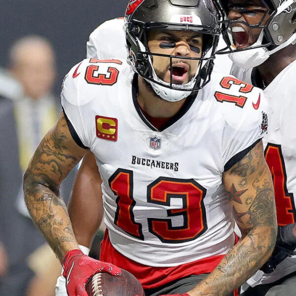 Fan Scores Big as Mike Evans Tosses Away Historic 100th Touchdown Ball